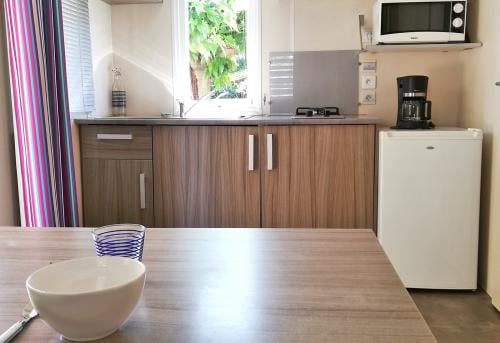 location mobil home six fours cuisine coucourelle